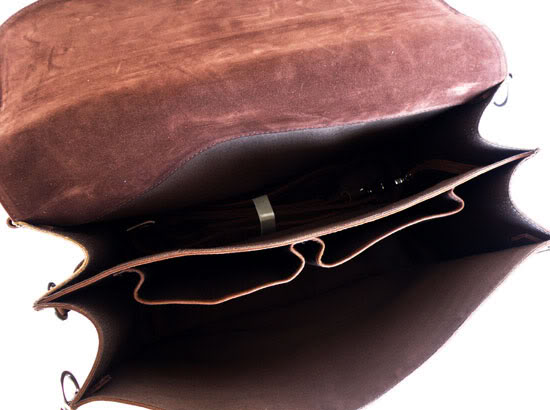 Interior view of crazy horse leather travel bag showing storage capacity