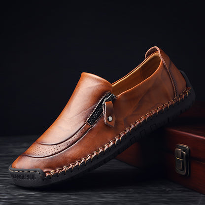 Close-up of durable anti-slip sole on men's casual leather-look flat shoes