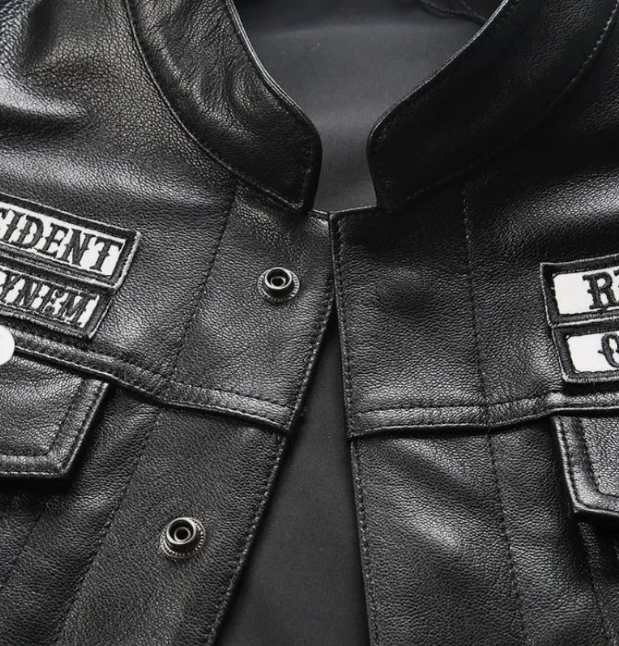 Close-up of snap front closure and multi-pocket layout on a Sons of Anarchy leather jacket