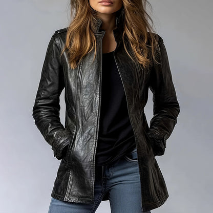Woman layering an oversized black leather cardigan jacket over a dress, Al-Noor Bazaar